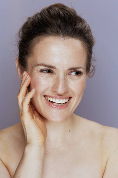 istock happy young female on blue 1432531857