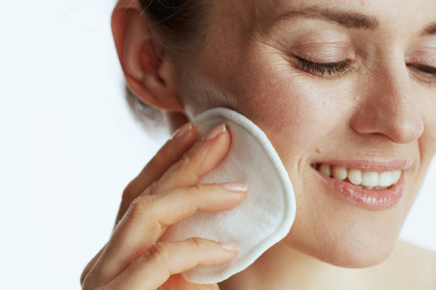istock happy modern female with cotton pad on white 1432532167