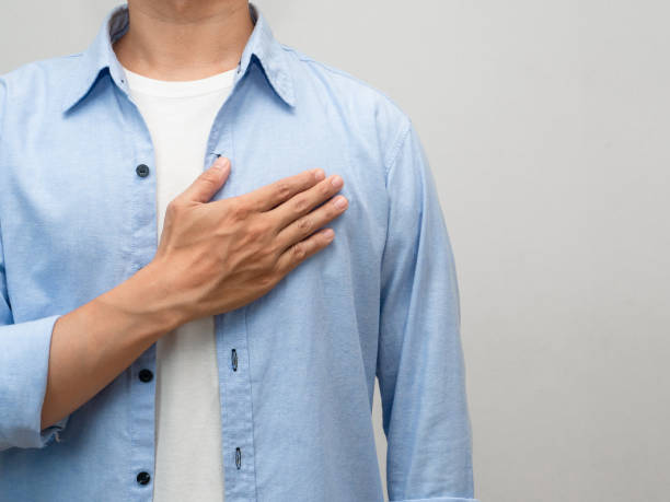 istock Close up man touch his chest for lover portrait studio shot 1432535272