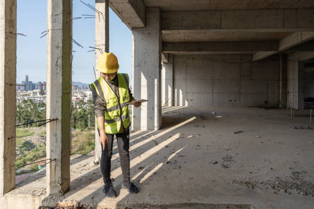 istock An Asian woman worker uses a tablet computer on a construction site 1432537031