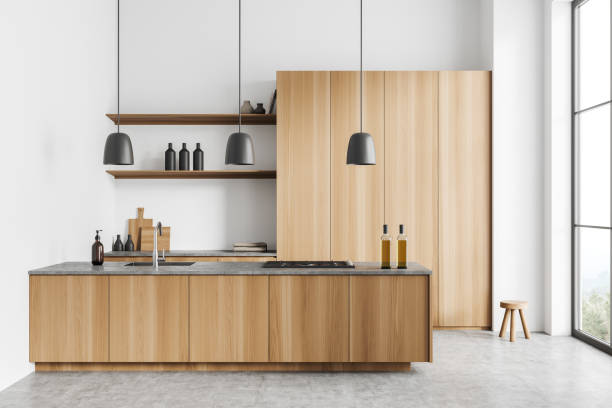istock Light kitchen interior with bar island, shelves and panoramic window 1432537959