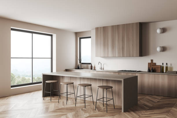 istock Light kitchen interior with island and seats, kitchenware and window 1432538327