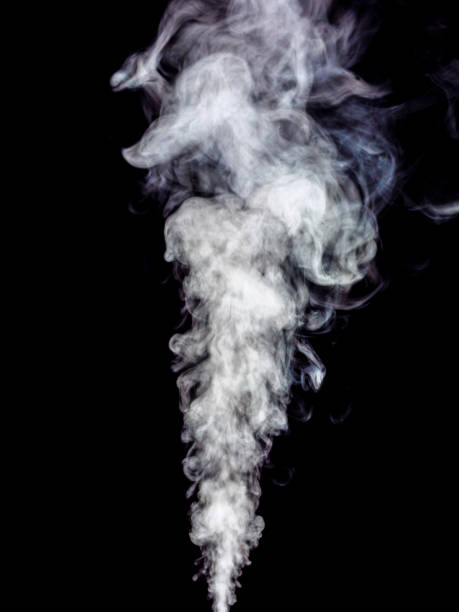 istock Swirling wisp of white smoke on a black 1432541122