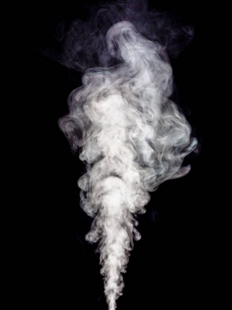 istock White fluffy smoke swirls and spinning on black 1432541133