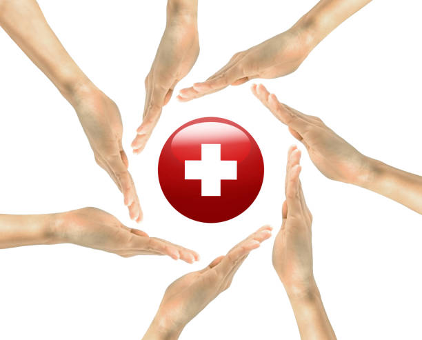 Concept of medicine and the Red Cross. red cross symbol in human hands