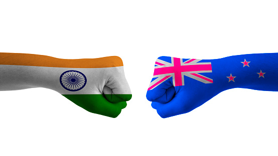 india vs new zealand hand flag Man hands patterned with the india vs Ireland flag