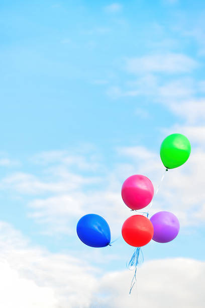 istock bright balloons against the blue sky 1432549747