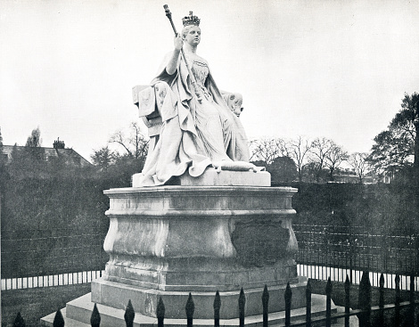 Designed by Princess Louise 1893. This marble statue shows Queen Victoria in her coronation robes at the age of 18