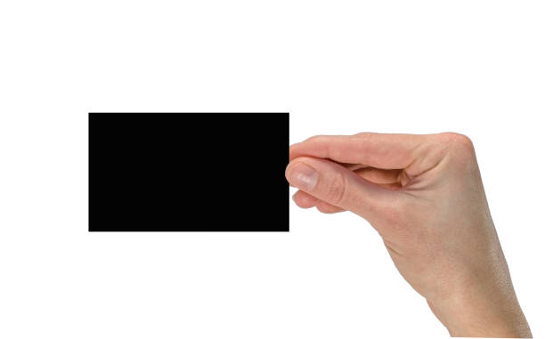 istock Hand holding a black business card 1432552618