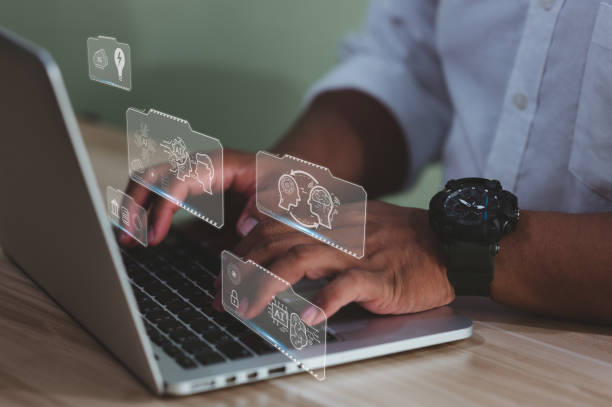 istock Contact Us Jobs or Connected Customer Support Hotline Businessman using laptop and tapping 1432556045