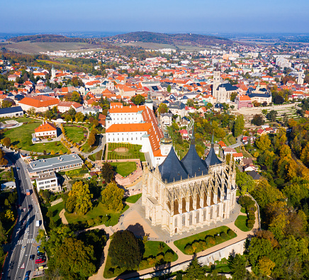 Aerial view of historical centre of small Czech town of Kutna Hora in autumn day overlooking St. Barbara Church and Jesuit College
