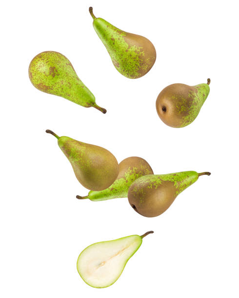 istock Falling Green conference pear isolated on white background, clipping path, full depth of field 1432560408