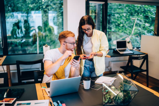 istock Young students surfing on cellphones 1432562830