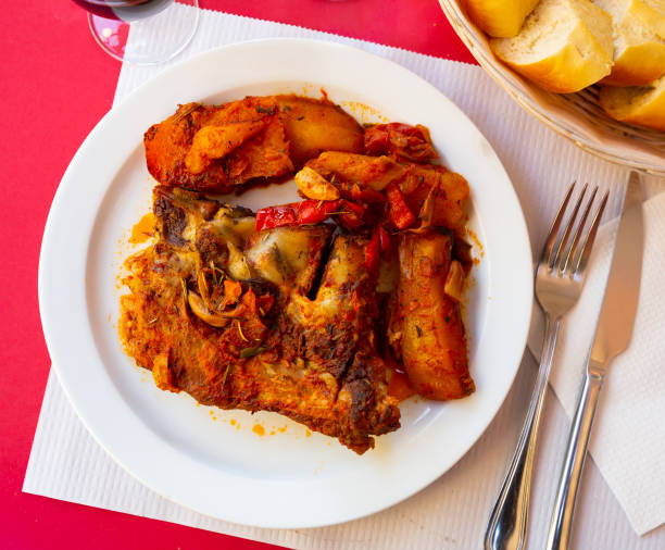 istock Ribs with vegetables prepared and served on plate 1432563297