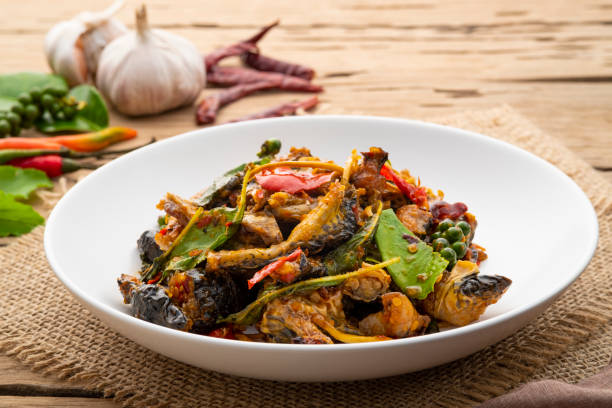 istock Spicy Stir Fried Frog meat with chilli paste and basil leave 1432563808