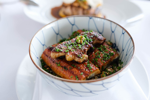 Grilled eel rice bowl with foie gras on top, unadon.