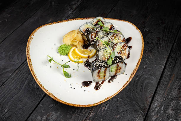 istock sushi roll with wasabi  on the plate. 1432566044