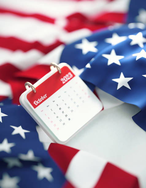 istock October 2023 Calendar Over Rippled American Flag 1432566522