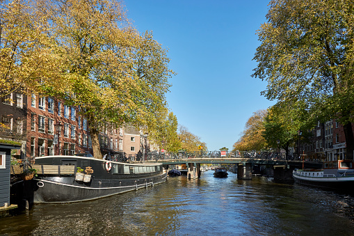 City canal with houseboats in Amsterdam, The Netherlands