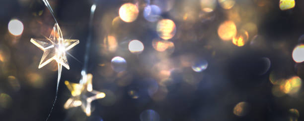 istock star shape led lights on shiny abstract blurred background, festive illumination at night for holiday celebrations with copy space 1432568448