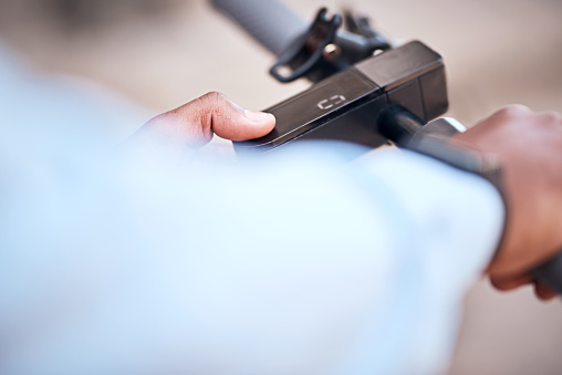 Hands, security and bike with the thumb of a man on a fingerprint scanner to unlock eco friendly transport. Digital technology, lock and hiring of a bicycle with a male customer using a scanner