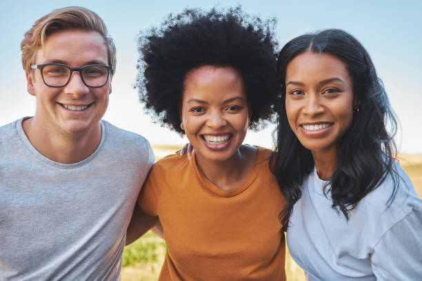 istock Diversity, happy with friends together in fun collaboration and teamwork quality time on a countryside farm. Relax, happy and summer people on holiday vacation in the nature outdoors 1432569141