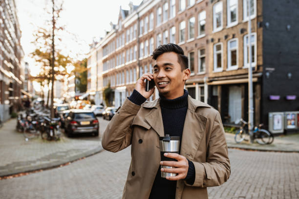 istock Japanese businessman talking on the phone 1432570384