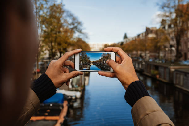 istock Unrecognisable tourist visiting Amsterdam and enjoying city break 1432570421