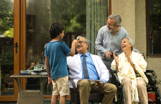 istock Doctor having fun with multi generation family at home 1432571412