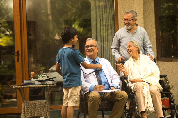 istock Doctor having fun with multi generation family at home 1432571540