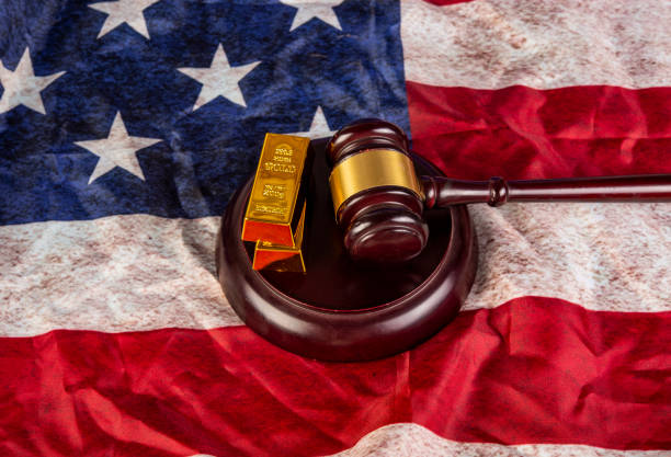 istock Gold bars with gavel on USA flag background 1432581392