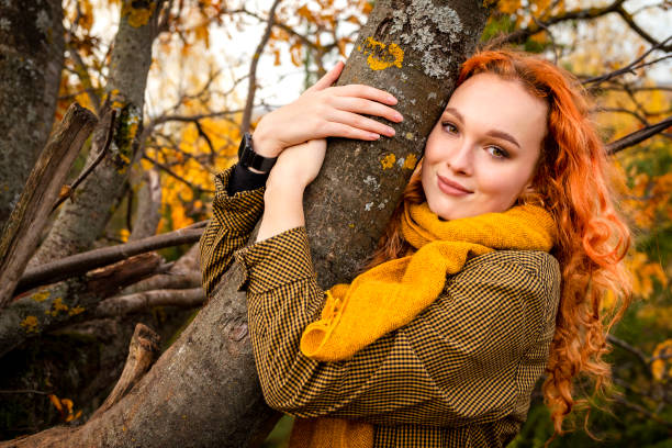Free Stock Photo of Woman With Red Hair Standing in Front of Tree ...