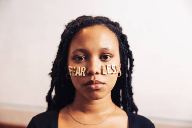 istock Teenage girl sending a message written on her cheeks 1432584321