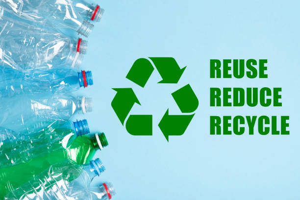 istock Single use plastic bottles and recycling symbol with reuse reduce recycle text 1432590150