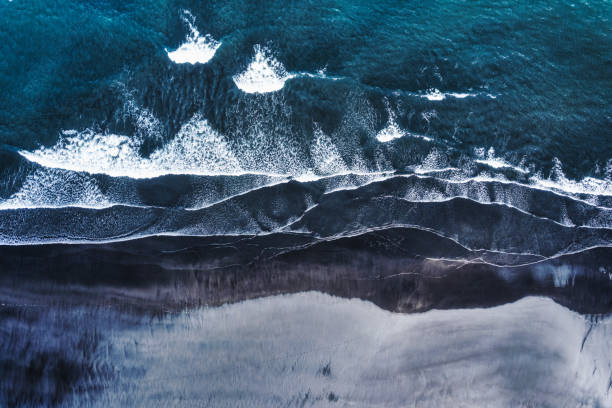 istock Moody atlantic ocean wave on black sand beach in summer at Iceland 1432590902