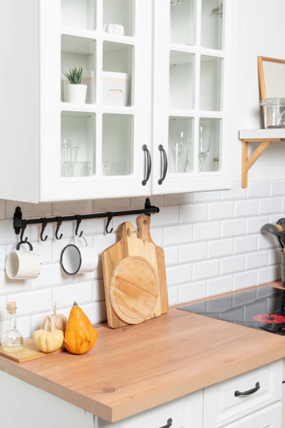 istock modern kitchen counter interior with cups and cutting boards 1432594469