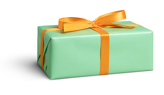 Green gift box with orange ribbon on white. This file is cleaned, retouched and contains clipping path.