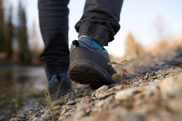 istock men's footsteps on the beach of river 1432597001