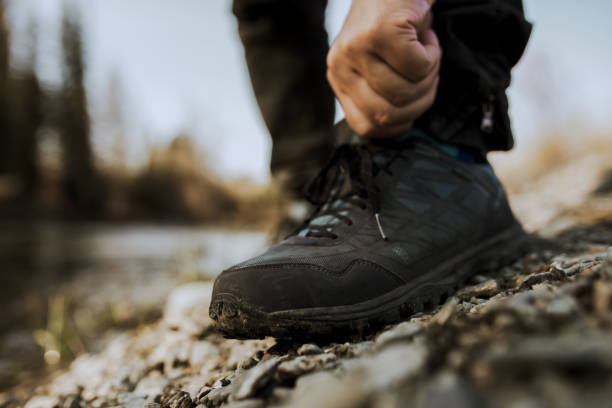 istock men's footsteps on the beach of river 1432597003