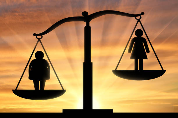 istock Thick and normal woman on scales 1432606541