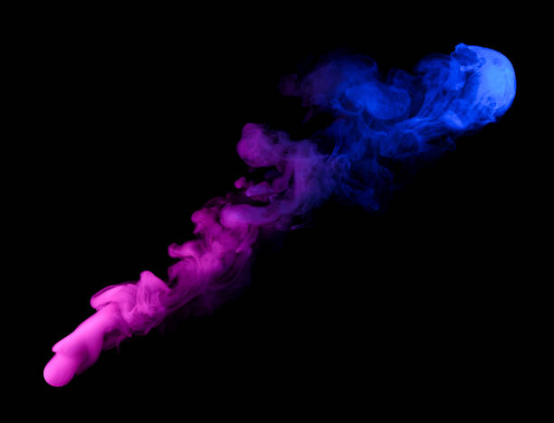 istock Swirling neon colored smoke puff cloud isolated on black 1432606775