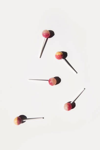 istock Lolipop candies lie on a white background. Top view, flat lay 1432606913