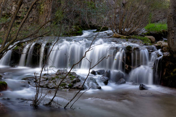 istock Waterfall in a mountain river in long exposure 1432609963