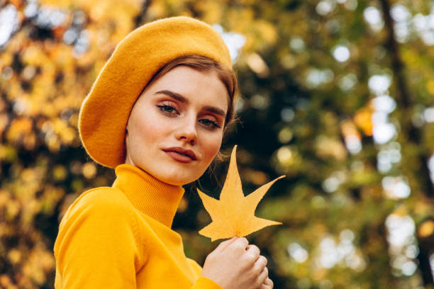 istock Beautiful woman enjoying autumn 1432610549