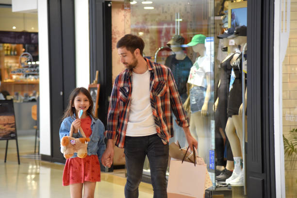 istock father with his daughter at the mall 1432610591