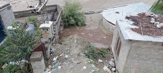 Flood in River Gilgit, washed water supply pump.