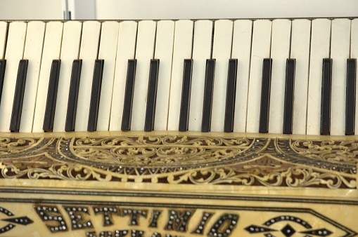 piano keys of an old used piano
