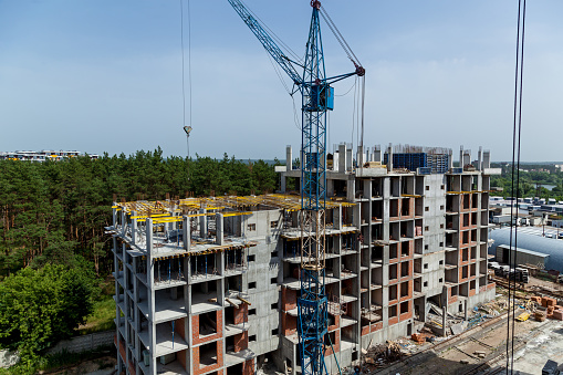 Construction of monolithic multi-storey buildings. Construction of a monolithic reinforced concrete house. Modern building technologies. Construction of a modern multi-storey building