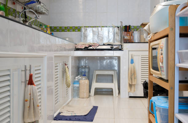 istock The modern kitchen with the white tile wall and black counter. 1432619944