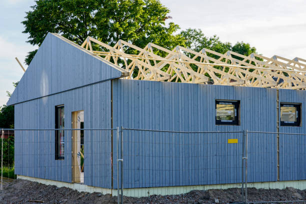 istock Assembly of a new modern ecological private house using prefabricated wooden panels 1432620603